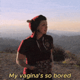 a woman wearing a red hoodie says my vagina 's so bored