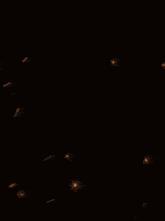 a close up of a fire explosion in the dark