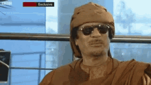 ضحكة القذافي الرؤساء العرب ضحك ابتسامة مسخرة GIF - Libya Qaddafi Speeches GIFs