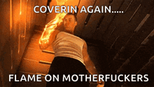 a man is holding a flame in his hand with the words coverin again flame on motherfuckers