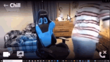 a computer screen shows a person sitting in a chair with the word chill on the bottom