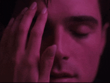 A Hand Rubbing Elvis Face Priscilla Film GIF