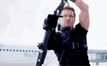 Jeremy Renner Aim GIF - Jeremy Renner Aim Hawk Eye GIFs