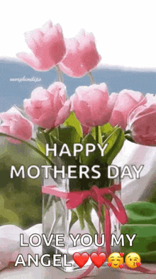 a bouquet of pink flowers in a vase with the words `` happy mothers day love you my angel '' .