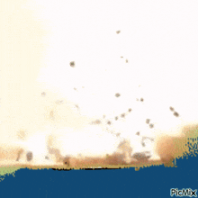 a computer generated image of an explosion with picmix at the bottom right