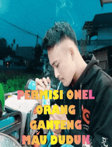 a man smoking a cigarette with the words permisi onel orang ganteng mau duduk