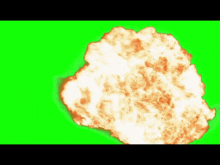 an explosion with a green screen in the background