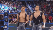 The Colons Entrance GIF - The Colons Entrance Wwe GIFs