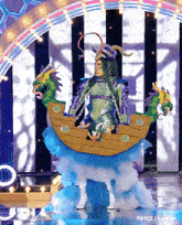 a person in a costume that looks like a boat on a stage