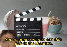 a clapper board with the words " you 're gonna wanna see this one in the theaters " below it