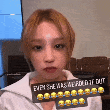 a girl with a sticker that says even she was weirded tf out