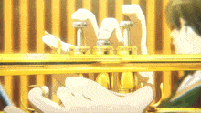 a person is holding a trumpet with a striped background