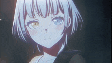 a girl with white hair and blue eyes looks angry