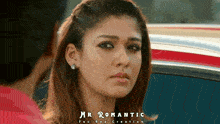 a close up of a woman 's face with mr romantic written on the bottom