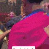 a man wearing a red and blue jersey with the name raphinha on it