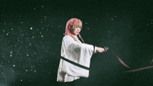 a woman in a pink wig holds a sword in front of chinese writing