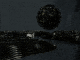 a black object is floating in the air above a landscape