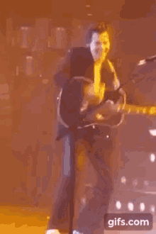 Harry Styles Guitar GIF - Harry Styles Guitar Dancing GIFs
