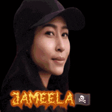 a woman wearing a hat with the name zameel written on it