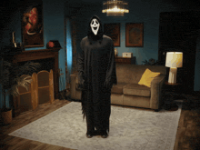 a person in a grim reaper costume standing in a living room
