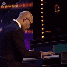 Playing Piano Emmanuel Vass GIF - Playing Piano Emmanuel Vass Britains Got Talent GIFs