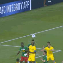 a soccer game is being played in front of an afc integrity app