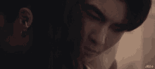 a close up of a person 's face with jill written below it