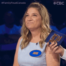 a woman wearing a name tag that says josie