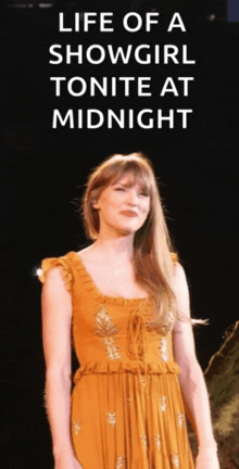 a woman in an orange dress stands on a stage with the words life of a showgirl tonite at midnight written below her