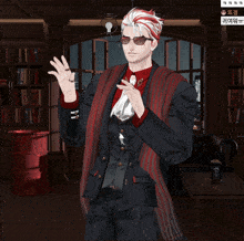 a man wearing sunglasses and a red scarf stands in a room