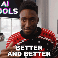 a man in a red and black sweater is giving a thumbs up and says better and better
