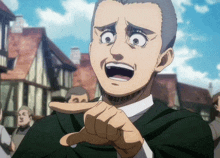 a man in a green shirt making a funny face