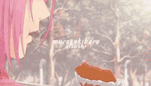 a girl with pink hair is eating a piece of cake with the words mucasakibara written on it