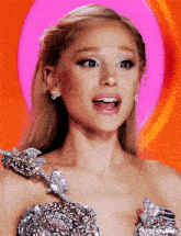 a close up of a woman 's face with the word ariana on the bottom