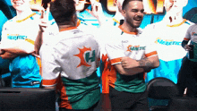 a man in a white shirt with the letter h on the back