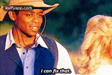 a man in a cowboy hat says i can fix that to a woman .