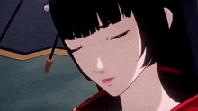 a close up of a girl with her eyes closed and an umbrella