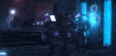 a person in a futuristic suit with a tv head is standing in a dark room with a blue light coming out of it .