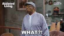 an advertisement for assisted living shows a man saying " what "