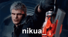 a man holding a sword with the word nikua written on the bottom