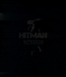a black background with the words hitman written in white letters