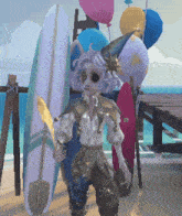 a girl in a jester costume stands in front of a surfboard