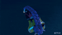 a person is flying through the air with a purple light coming out of their feet .