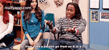 a group of people are sitting in chairs talking about how does a person go from an a to a d.