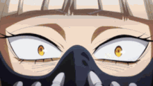 a close up of a person 's eyes with a mask on their face .