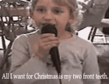 All I Want For Christmas Is My Two Front Teeth GIF