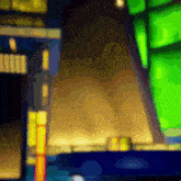 a blurred image of a stained glass window with yellow and green lights