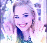 a woman is smiling and waving her hands with the word me in the background