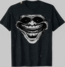 a black t-shirt with a cartoon face on it
