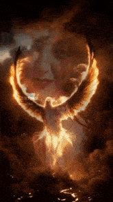 a woman 's face is surrounded by flames and a phoenix flying in the sky .